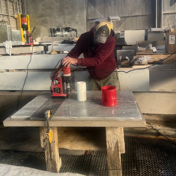 drilling holes in panel 